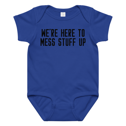 "We're Here To Mess Stuff Up" printed on a royal baby jersey bodysuit laying on a flat surface amongst other clothes