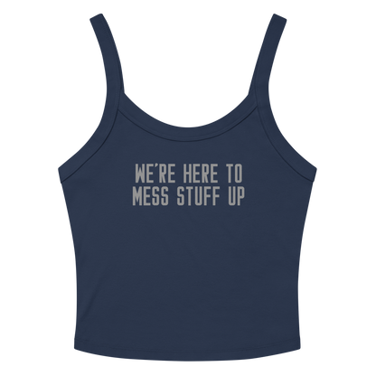 "We're Here To Mess Stuff Up" printed on a solid navy blend women's micro-rib tanktop laying on a flat surface amongst sunglasses and shorts
