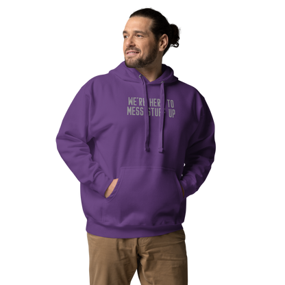 "We're Here To Mess Stuff Up" printed on a purple unisex hoodie worn by a male