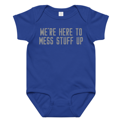 "We're Here To Mess Stuff Up" printed on a royal baby jersey bodysuit laying on a flat surface amongst other clothes