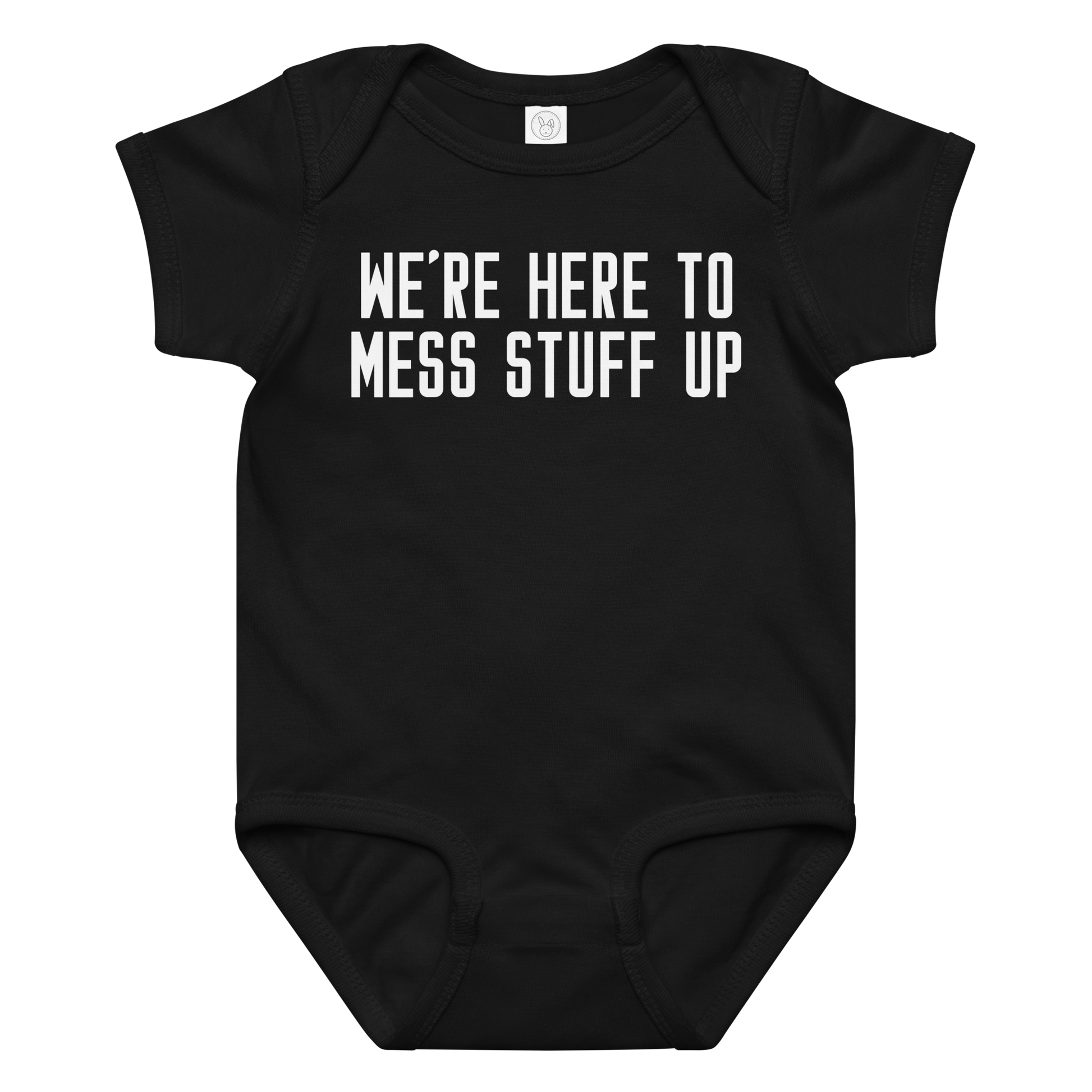 "We're Here To Mess Stuff Up" printed on a black baby jersey bodysuit laying on a flat surface amongst other clothes