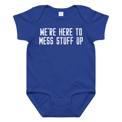 "We're Here To Mess Stuff Up" printed on a royal baby jersey bodysuit laying on a flat surface amongst other clothes