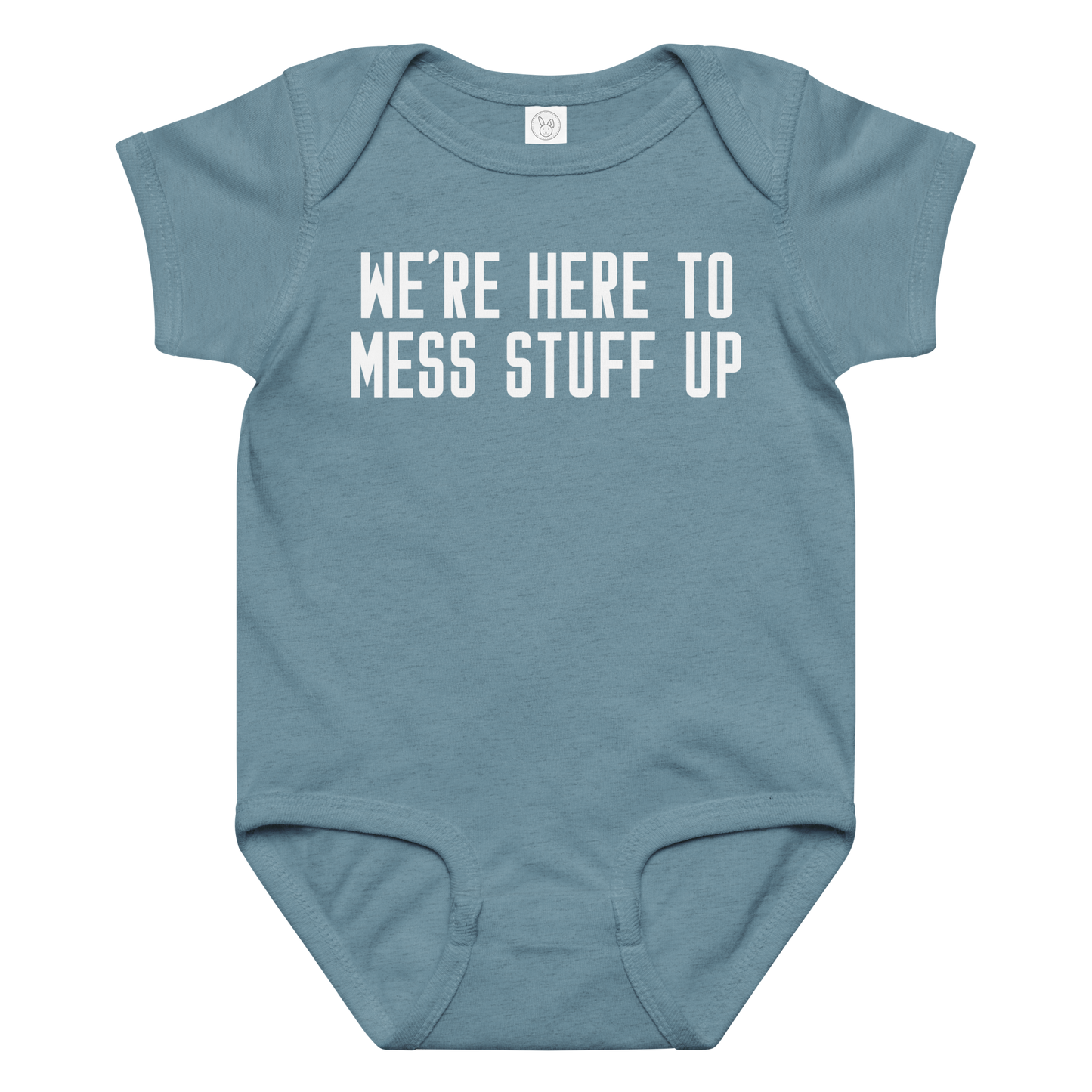 "We're Here To Mess Stuff Up" printed on a vintage indigo baby jersey bodysuit laying on a flat surface amongst other clothes