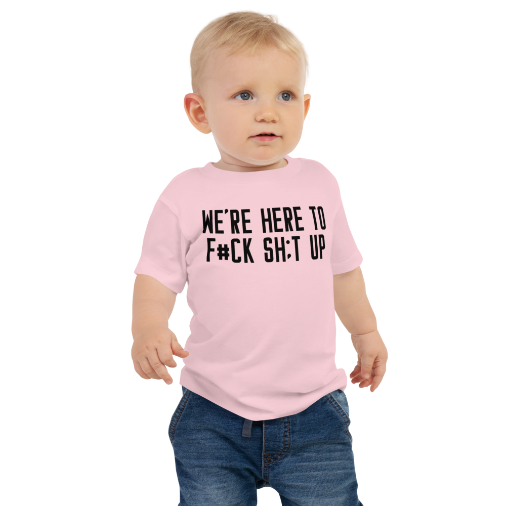 "We're Here To F#Ck Sh:t Up" printed on a pink baby jersey short sleeve tee worn by a male