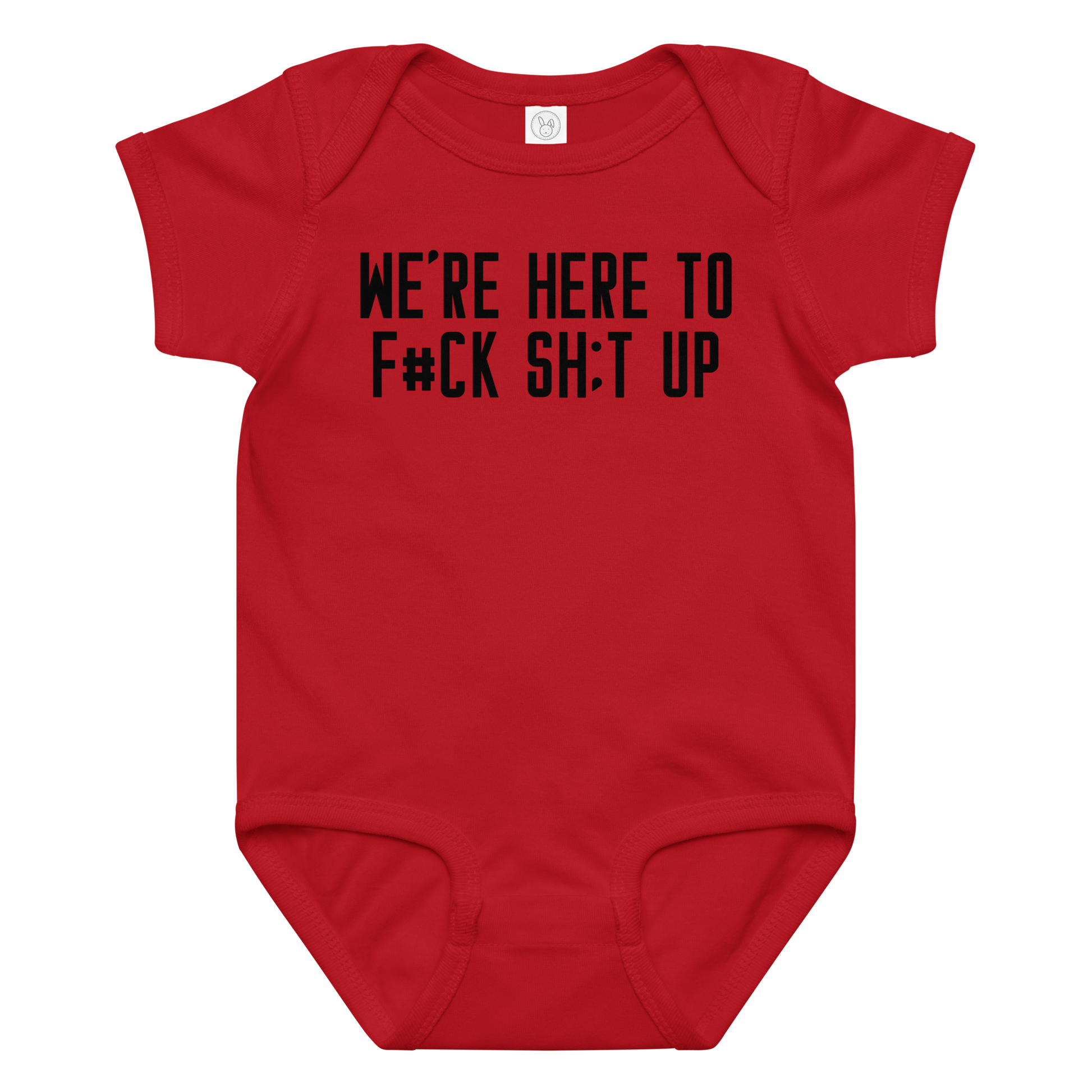 "We're Here To F#Ck Sh:t Up" printed on a red baby jersey bodysuit laying on a flat surface amongst other clothes