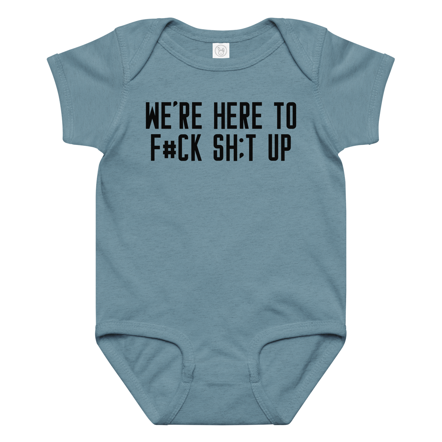 "We're Here To F#Ck Sh:t Up" printed on a vintage indigo baby jersey bodysuit laying on a flat surface amongst other clothes