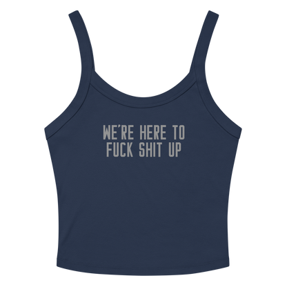 "We're Here To Fuck Shit Up" printed on a solid navy blend women's micro-rib tanktop laying on a flat surface amongst sunglasses and shorts