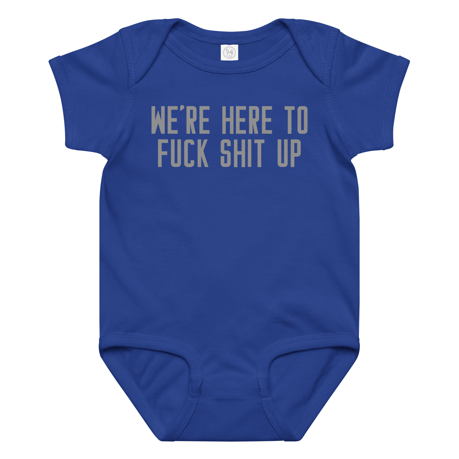 "We're Here To Fuck Shit Up" printed on a royal baby jersey bodysuit laying on a flat surface amongst other clothes