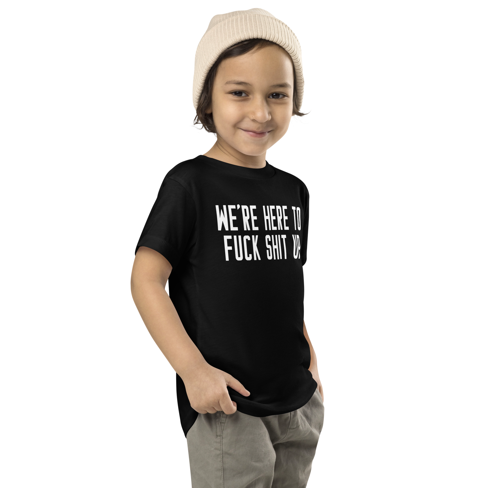 "We're Here To Fuck Shit Up" printed on a black toddler short sleeve tee worn by a male who is also wearing a knit cap