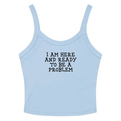 "I am here and ready to be a problem" printed on a solid baby blue blend women's micro-rib tanktop laying on a flat surface amongst sunglasses and shorts