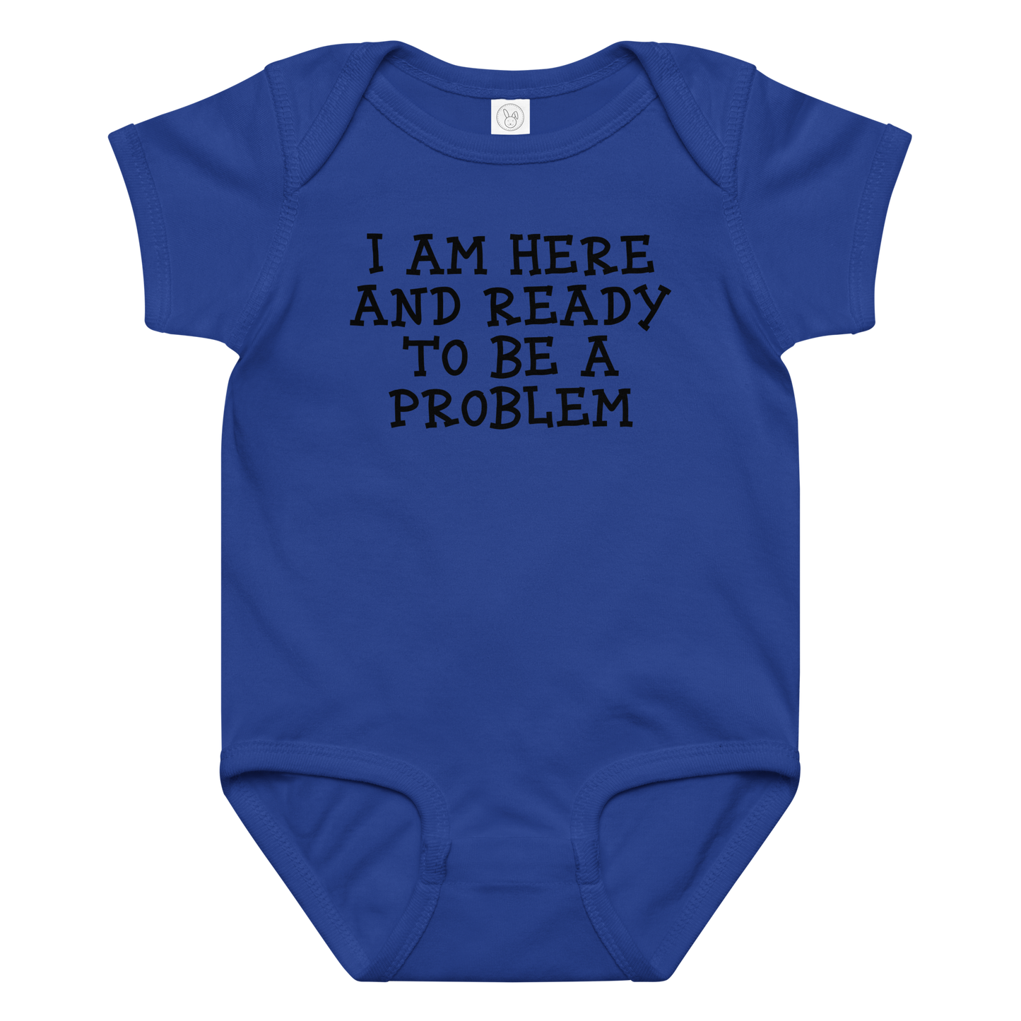 "I am here and ready to be a problem" printed on a royal baby jersey bodysuit laying on a flat surface amongst other clothes