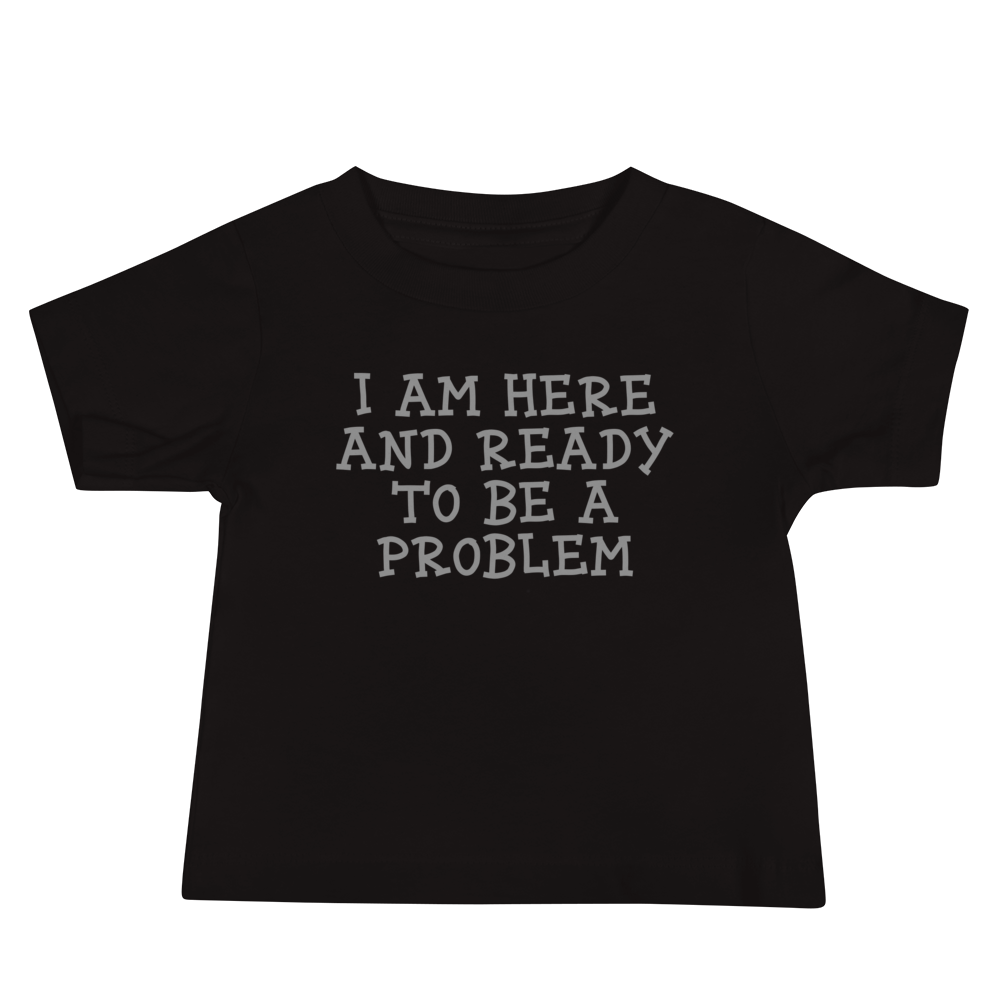 "I am here and ready to be a problem" printed on a black baby jersey short sleeve tee laying on a flat surface