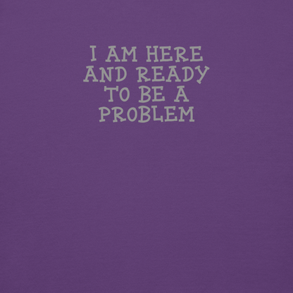 "I am here and ready to be a problem" printed on a purple background