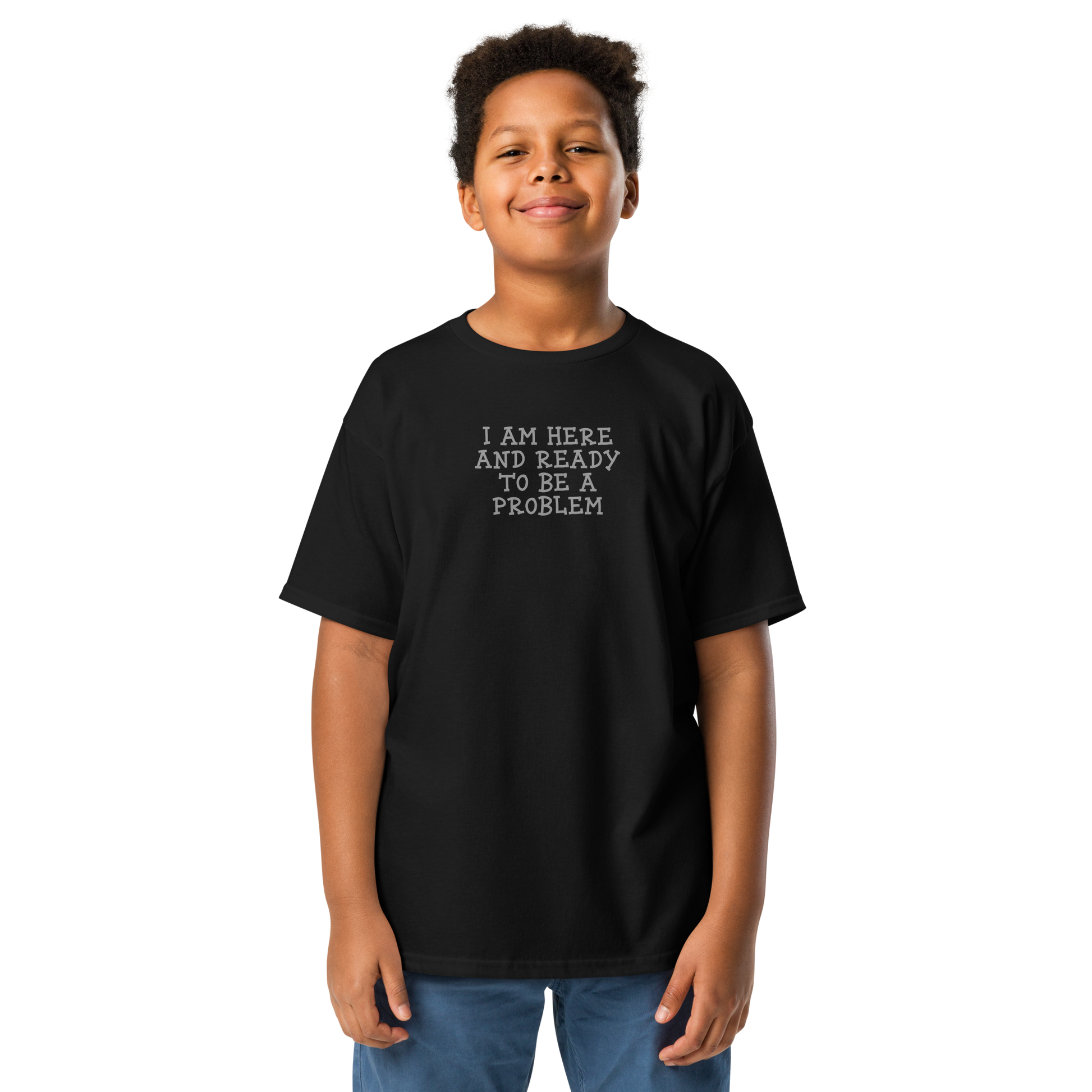 "I am here and ready to be a problem" printed on a black youth classic tee worn by a male