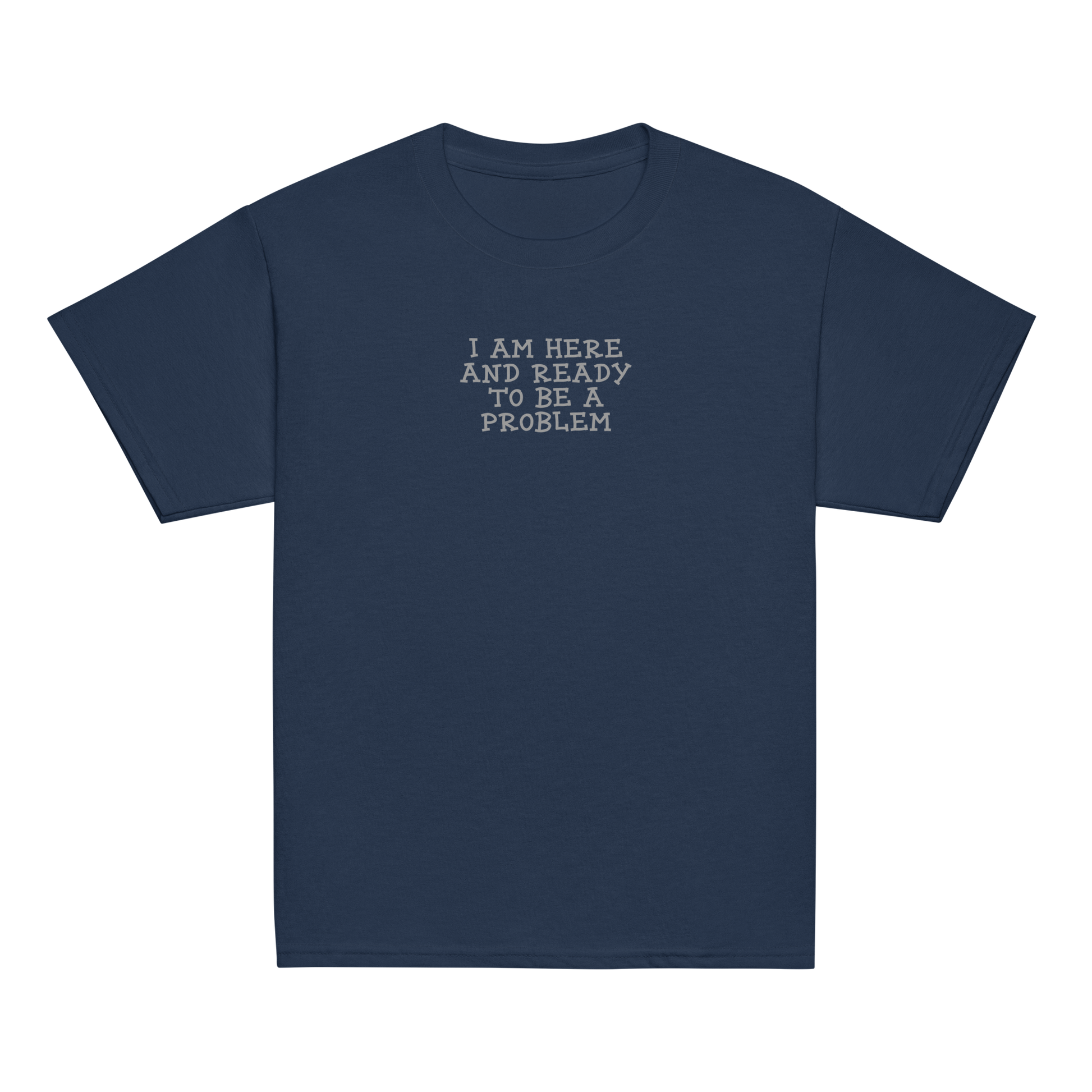 "I am here and ready to be a problem" printed on a navy youth classic tee laying on a flat surface