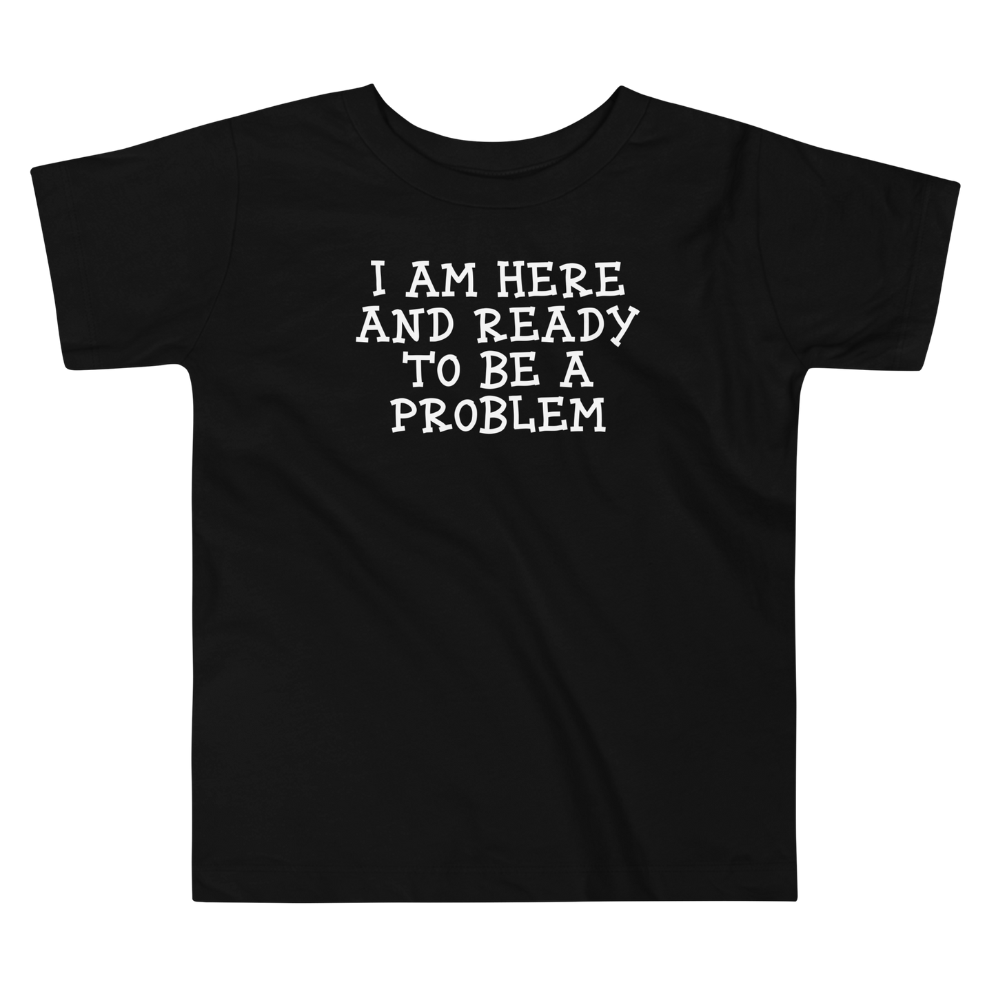 "I am here and ready to be a problem" printed on a black toddler short sleeve tee laying on a flat surface