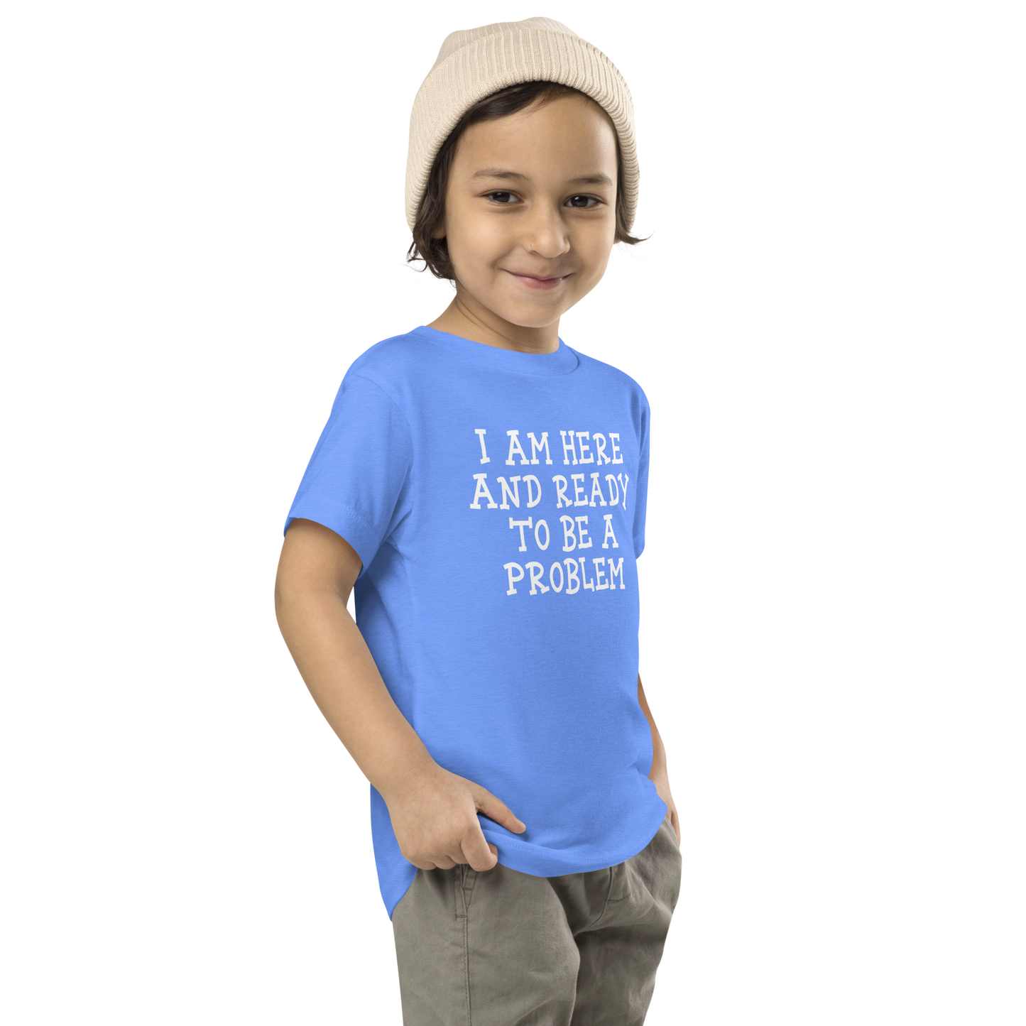"I am here and ready to be a problem" printed on a heather columbia blue toddler short sleeve tee worn by a male who is also wearing a knit cap