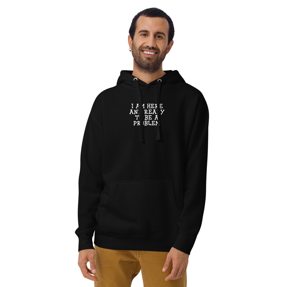 "I am here and ready to be a problem" printed on a black warn by a male