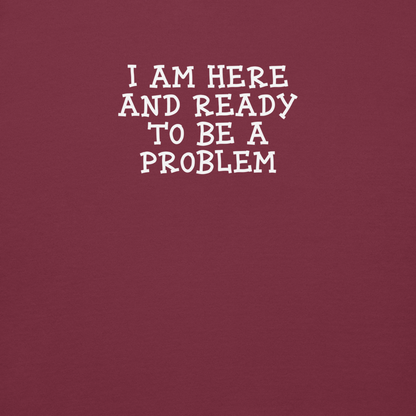 "I am here and ready to be a problem" printed on a maroon background
