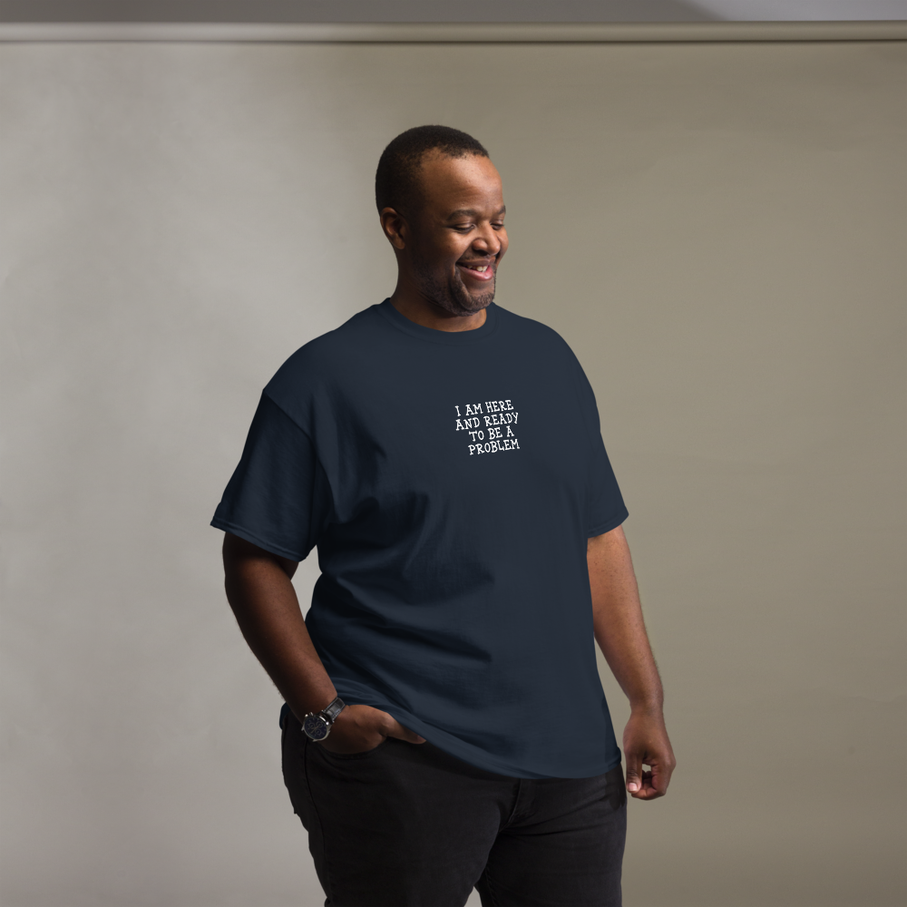 "I am here and ready to be a problem" printed on a navy unisex classic tee worn by a male