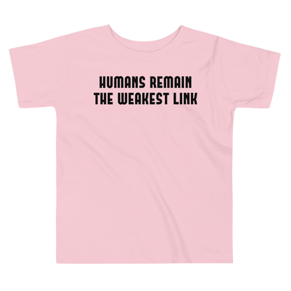 "Humans remain the weakest link" printed on a pink toddler short sleeve tee laying on a flat surface