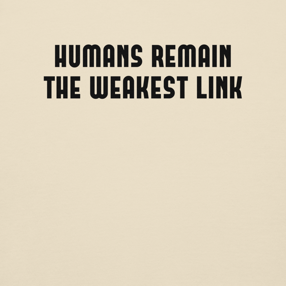 "Humans remain the weakest link" printed on a bone background