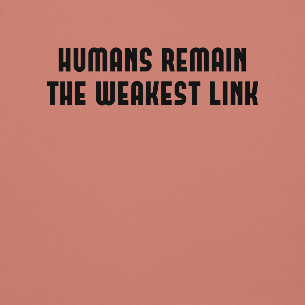"Humans remain the weakest link" printed on a dusty rose background