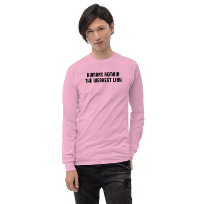 "Humans remain the weakest link" printed on a light pink men's long sleeve shirt worn by a male