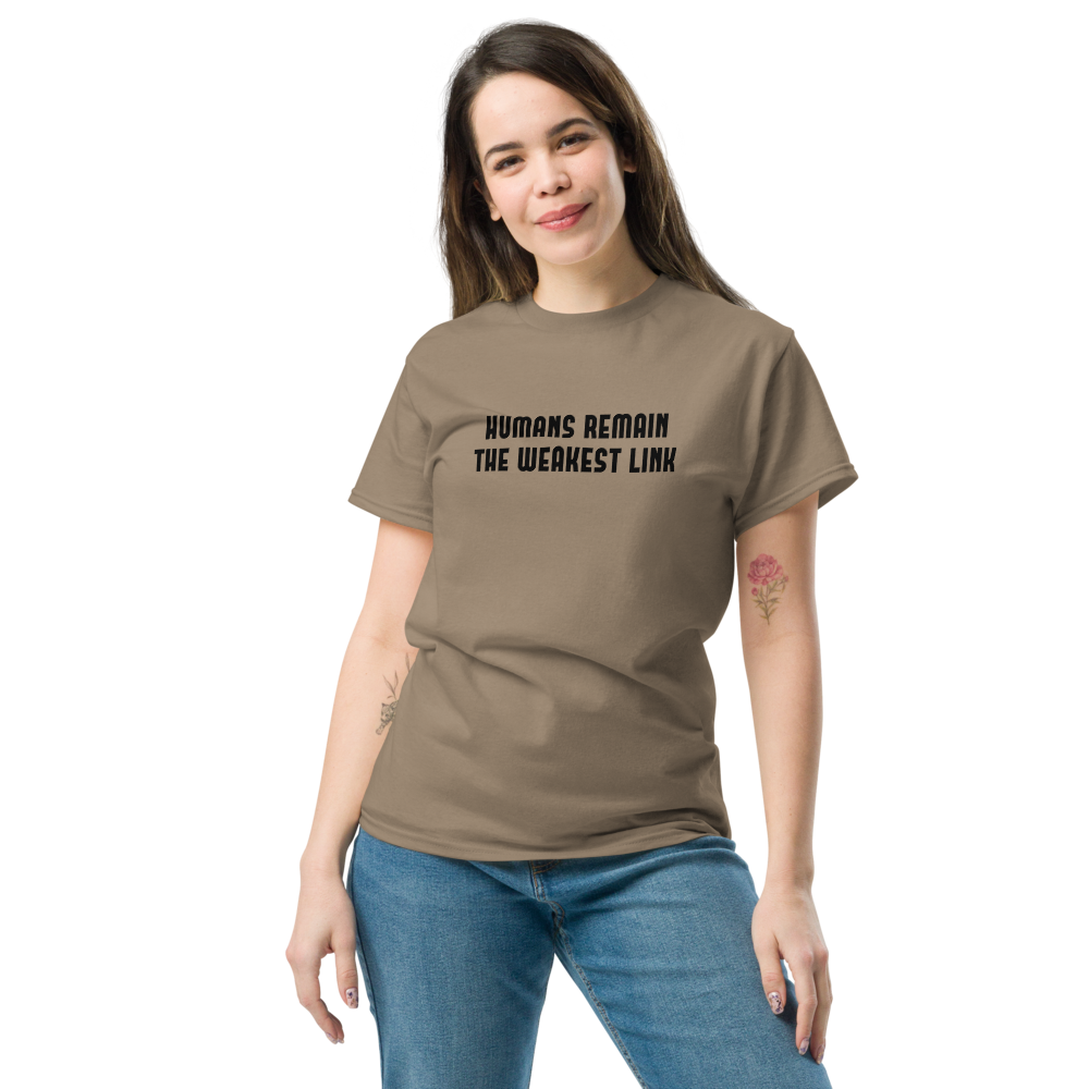 "Humans remain the weakest link" printed on a brown savana unisex classic tee worn by a female