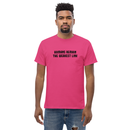 "Humans remain the weakest link" printed on a heliconia unisex classic tee worn by a male