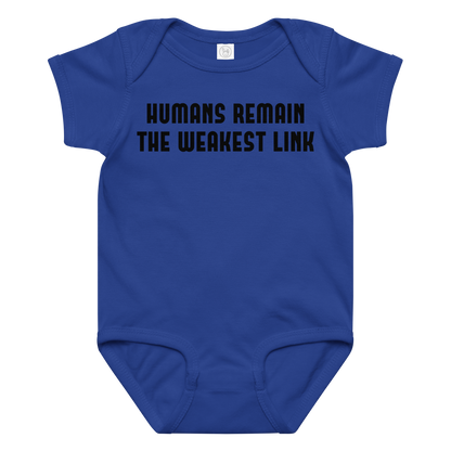 "Humans remain the weakest link" printed on a royal baby jersey bodysuit laying on a flat surface amongst other clothes