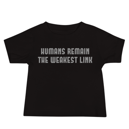 "Humans remain the weakest link" printed on a black baby jersey short sleeve tee laying on a flat surface