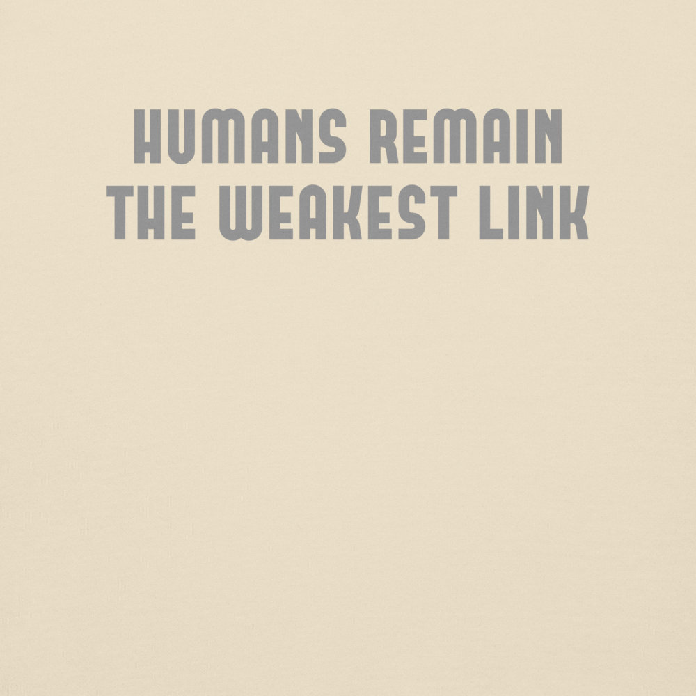 "Humans remain the weakest link" printed on a bone background