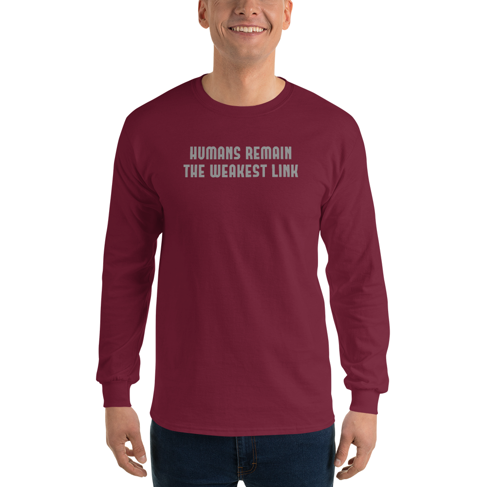 "Humans remain the weakest link" printed on a maroon men's long sleeve shirt worn by a male