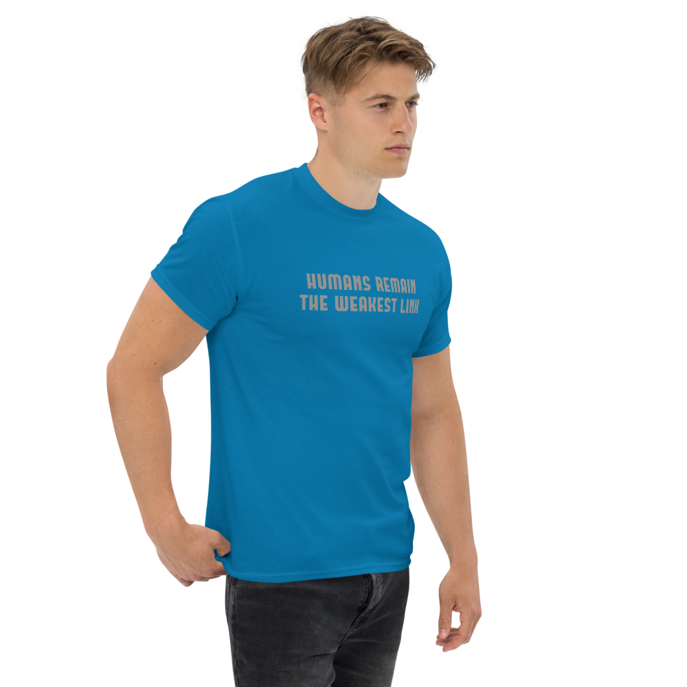"Humans remain the weakest link" printed on a sapphire unisex classic tee worn by a male