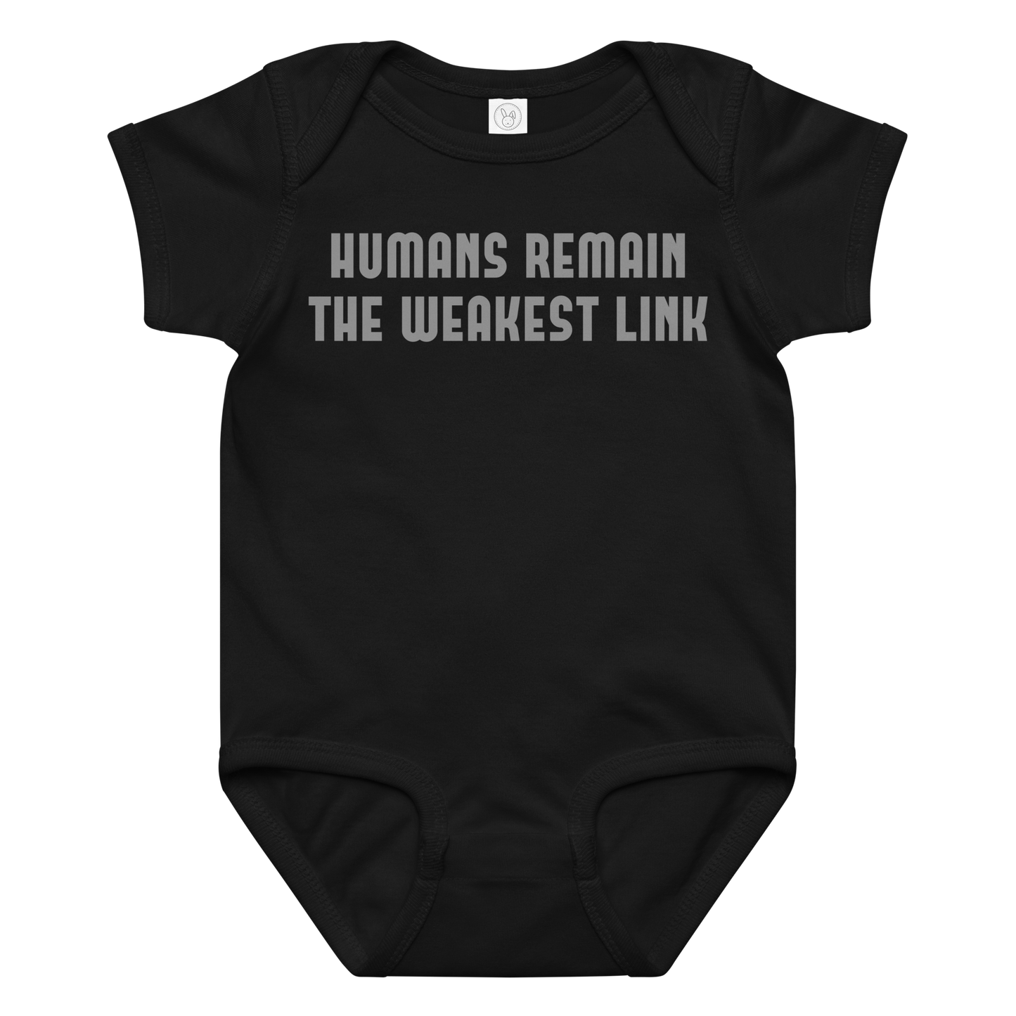 "Humans remain the weakest link" printed on a black baby jersey bodysuit laying on a flat surface amongst other clothes