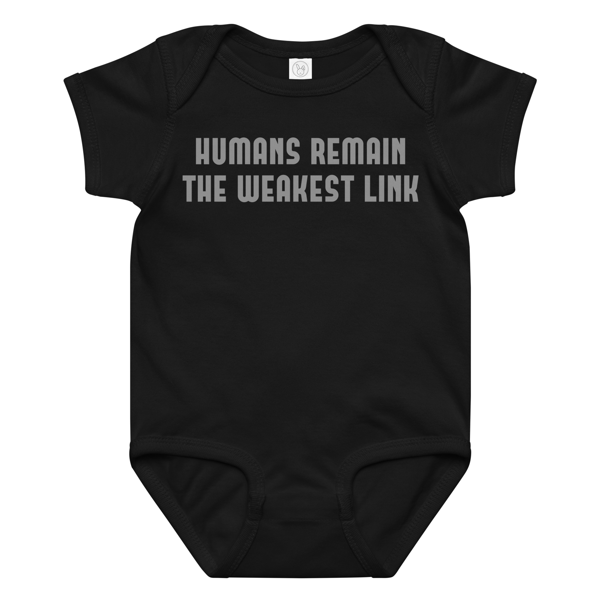 "Humans remain the weakest link" printed on a black baby jersey bodysuit laying on a flat surface amongst other clothes
