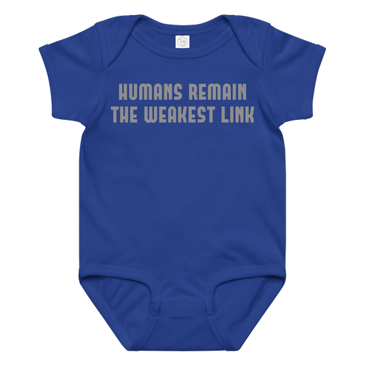"Humans remain the weakest link" printed on a royal baby jersey bodysuit laying on a flat surface amongst other clothes