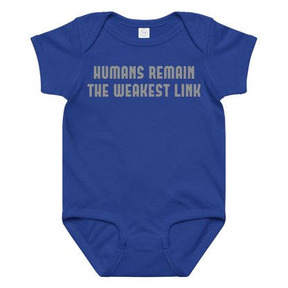 "Humans remain the weakest link" printed on a royal baby jersey bodysuit laying on a flat surface amongst other clothes