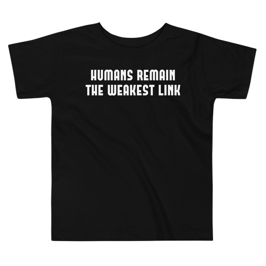 "Humans remain the weakest link" printed on a black toddler short sleeve tee laying on a flat surface