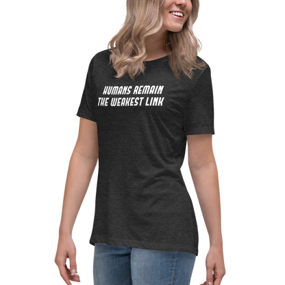 "Humans remain the weakest link" printed on a dark grey heather women's relaxed t-shirt worn by a female