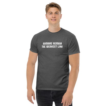 "Humans remain the weakest link" printed on a dark heather unisex classic tee worn by a male