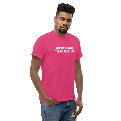 "Humans remain the weakest link" printed on a heliconia unisex classic tee worn by a male