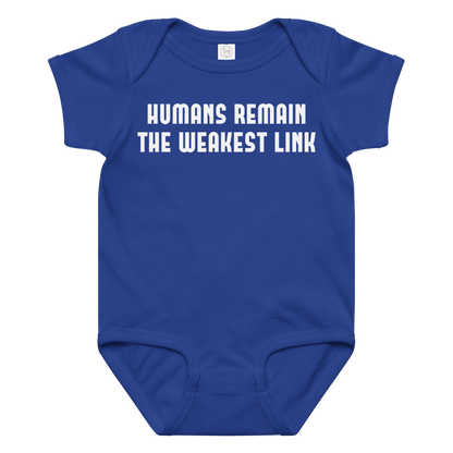 "Humans remain the weakest link" printed on a royal baby jersey bodysuit laying on a flat surface amongst other clothes