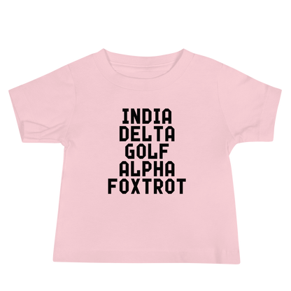 "India Delta Golf Alpha Foxtrot" printed on a pink baby jersey short sleeve tee laying on a flat surface