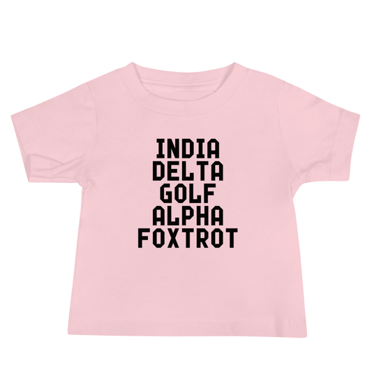 "India Delta Golf Alpha Foxtrot" printed on a pink baby jersey short sleeve tee laying on a flat surface