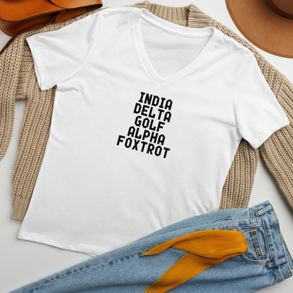 "India Delta Golf Alpha Foxtrot" printed on a solid white blend women's relaxed v-neck t-shirt laying on a flat surface amongst other clothes