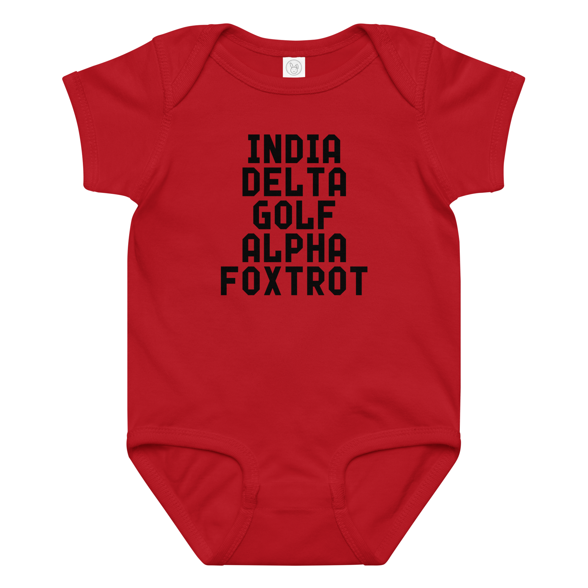 "India Delta Golf Alpha Foxtrot" printed on a red baby jersey bodysuit laying on a flat surface amongst other clothes