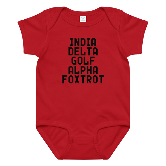 "India Delta Golf Alpha Foxtrot" printed on a red baby jersey bodysuit laying on a flat surface amongst other clothes