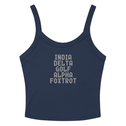 "India Delta Golf Alpha Foxtrot" printed on a solid navy blend women's micro-rib tanktop laying on a flat surface amongst sunglasses and shorts